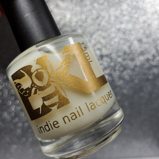 Image provided for Bee's Knees by a paid swatcher featuring the nail polish " Spirit "