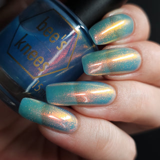 Image provided for Bee's Knees by a paid swatcher featuring the nail polish " Del Lago "