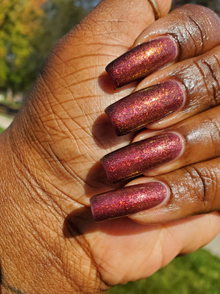 Image provided for Bee's Knees by a paid swatcher featuring the nail polish " Immutable "