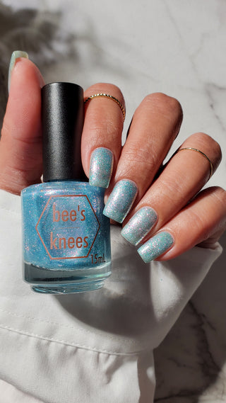 Image provided for Bee's Knees by a paid swatcher featuring the nail polish " Heartbreak "