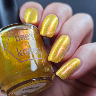 Image provided for Bee's Knees by a paid swatcher featuring the nail polish " Sunbird "