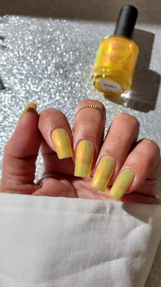 Image provided for Bee's Knees by a paid swatcher featuring the nail polish " Sunbird "