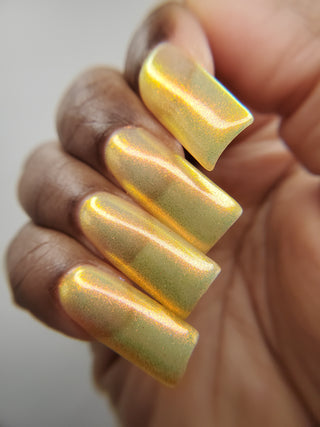 Image provided for Bee's Knees by a paid swatcher featuring the nail polish " Sunbird "