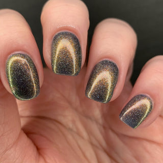 Image provided for Bee's Knees by a paid swatcher featuring the nail polish " Let Me Out "