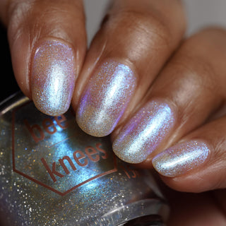 Image provided for Bee's Knees by a paid swatcher featuring the nail polish " Poisoned Fairy Fruit "