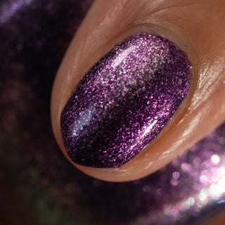 Image provided for Bee's Knees by a paid swatcher featuring the nail polish " Nevermore "