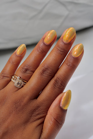 Image provided for Bee's Knees by a paid swatcher featuring the nail polish " Sunbird "