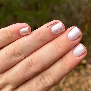 Image provided for Bee's Knees by a paid swatcher featuring the nail polish " Princess of Starlight "