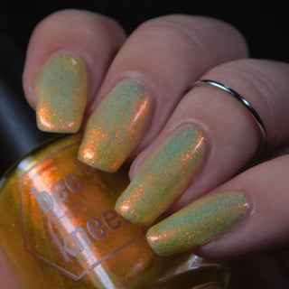 Image provided for Bee's Knees by a paid swatcher featuring the nail polish " Sunbird "