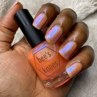 Image provided for Bee's Knees by a paid swatcher featuring the nail polish " The Phoenix Queen "