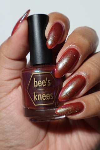 Image provided for Bee's Knees by a paid swatcher featuring the nail polish " Let's Give Them Hell "