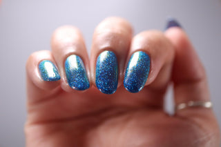Image provided for Bee's Knees by a paid swatcher featuring the nail polish " Cold Heartedness "
