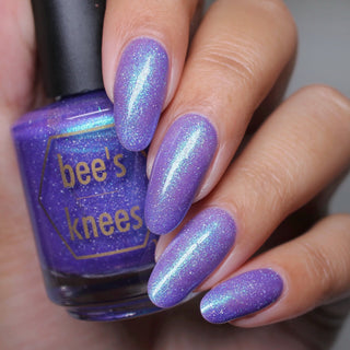 Image provided for Bee's Knees by a paid swatcher featuring the nail polish " Secrets "
