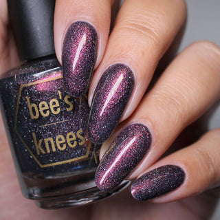 Image provided for Bee's Knees by a paid swatcher featuring the nail polish " The Black Horse "
