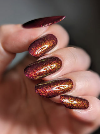 Image provided for Bee's Knees by a paid swatcher featuring the nail polish " Immutable "