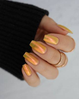 Image provided for Bee's Knees by a paid swatcher featuring the nail polish " Sunbird "