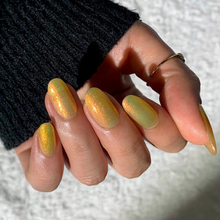 Image provided for Bee's Knees by a paid swatcher featuring the nail polish " Sunbird "