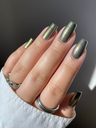 Image provided for Bee's Knees by a paid swatcher featuring the nail polish " Denial "