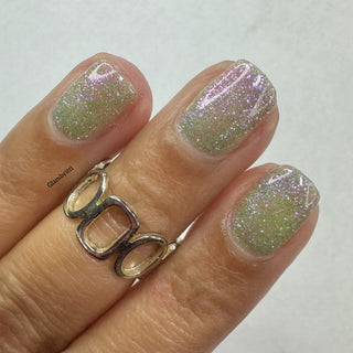 Image provided for Bee's Knees by a paid swatcher featuring the nail polish " Take Up Knitting "