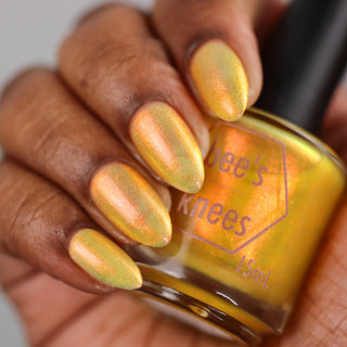 Image provided for Bee's Knees by a paid swatcher featuring the nail polish " Sunbird "