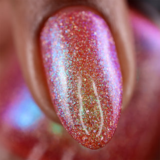 Image provided for Bee's Knees by a paid swatcher featuring the nail polish " The Crimson Moth "