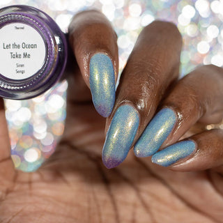 Image provided for Bee's Knees by a paid swatcher featuring the nail polish " Let the Ocean Take Me "