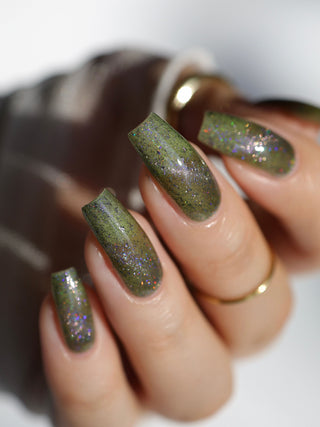 Image provided for Bee's Knees by a paid swatcher featuring the nail polish " What's a Little Blackmail Between Friends "