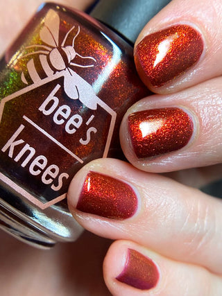 Image provided for Bee's Knees by a paid swatcher featuring the nail polish " The Dark Angel "