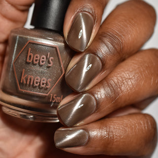 Image provided for Bee's Knees by a paid swatcher featuring the nail polish " Sky-fire "