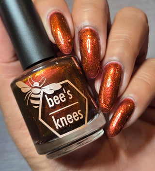 Image provided for Bee's Knees by a paid swatcher featuring the nail polish " The Dark Angel "