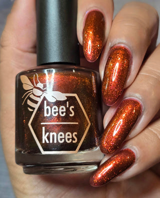 Image provided for Bee's Knees by a paid swatcher featuring the nail polish " The Dark Angel "