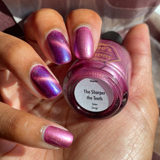 Image provided for Bee's Knees by a paid swatcher featuring the nail polish " The Sharper the Teeth "
