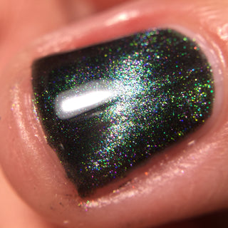 Image provided for Bee's Knees by a paid swatcher featuring the nail polish " Midnight Yoga and Seaweed "