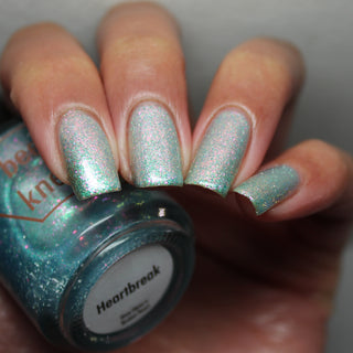 Image provided for Bee's Knees by a paid swatcher featuring the nail polish " Heartbreak "