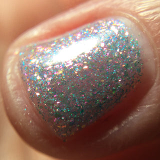 Image provided for Bee's Knees by a paid swatcher featuring the nail polish " Heartbreak "