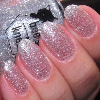 Image provided for Bee's Knees by a paid swatcher featuring the nail polish " Hold Your Unicorns "