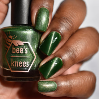 Image provided for Bee's Knees by a paid swatcher featuring the nail polish " Believing Something does not Make it True "