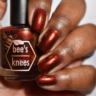 Image provided for Bee's Knees by a paid swatcher featuring the nail polish " The Dark Angel "