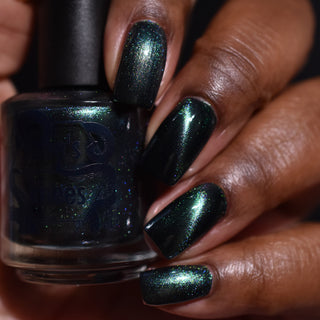 Image provided for Bee's Knees by a paid swatcher featuring the nail polish " Midnight Yoga and Seaweed "