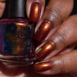 Image provided for Bee's Knees by a paid swatcher featuring the nail polish " The Bar is in Hell "