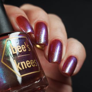 Image provided for Bee's Knees by a paid swatcher featuring the nail polish " Let's Give Them Hell "