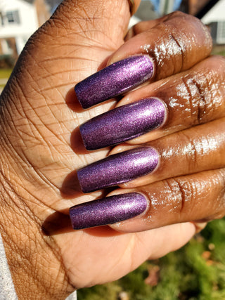 Image provided for Bee's Knees by a paid swatcher featuring the nail polish " Nevermore "