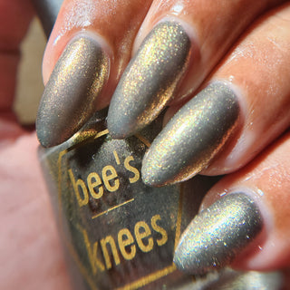 Image provided for Bee's Knees by a paid swatcher featuring the nail polish " Denial "