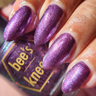 Image provided for Bee's Knees by a paid swatcher featuring the nail polish " Nevermore "