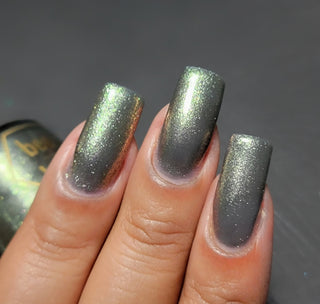 Image provided for Bee's Knees by a paid swatcher featuring the nail polish " Denial "