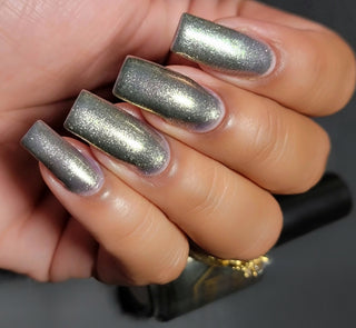 Image provided for Bee's Knees by a paid swatcher featuring the nail polish " Denial "