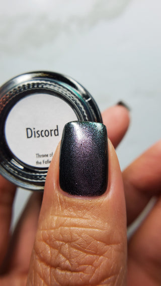 Image provided for Bee's Knees by a paid swatcher featuring the nail polish " Discord "