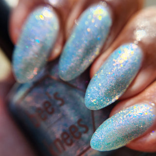 Image provided for Bee's Knees by a paid swatcher featuring the nail polish " Heartbreak "