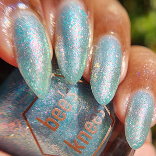 Image provided for Bee's Knees by a paid swatcher featuring the nail polish " Heartbreak "