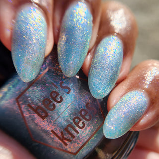 Image provided for Bee's Knees by a paid swatcher featuring the nail polish " Heartbreak "